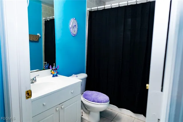 a bathroom with a sink and toilet