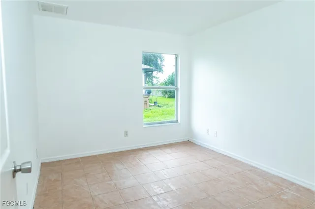 a view of a room that has a window in it