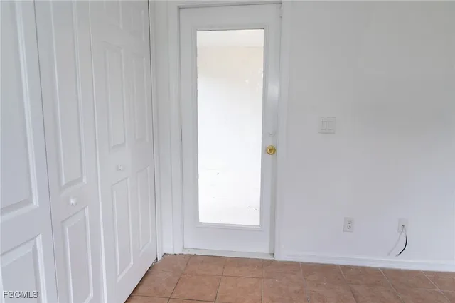 a view of backyard with green space