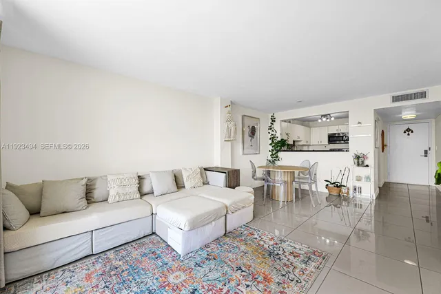 a living room with furniture and view of living room