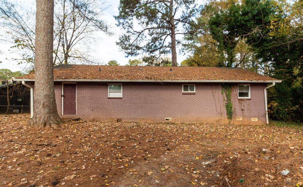687 Utoy Court Jonesboro, GA 30238 - Photo 3 of 3 a house that has a tree in front of it