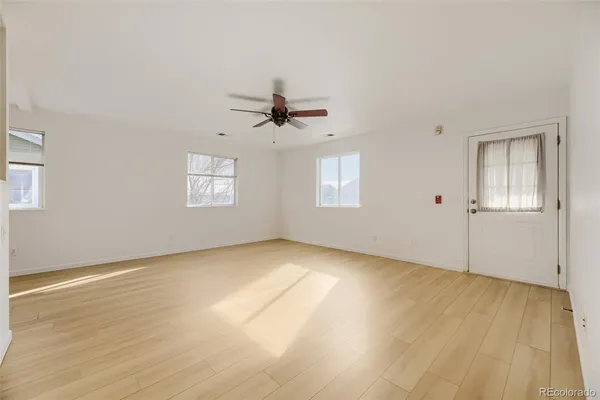 a kitchen with stainless steel appliances a refrigerator and a stove top oven