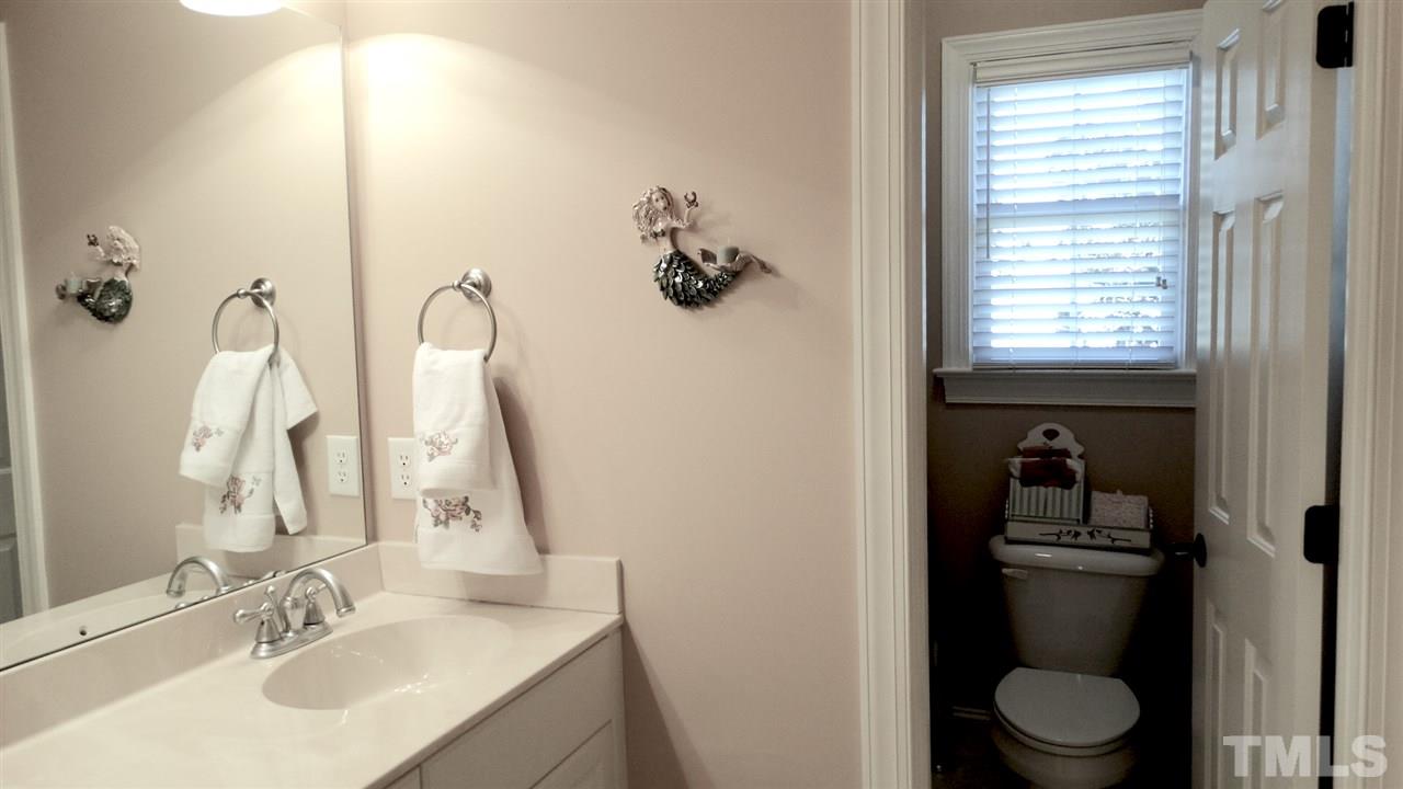 10335 Evergreen Spring Place Raleigh, NC 27614 - Photo 15 of 25 Double sinks, separate room for Enameled Tub and Custom-Tiled Walls, no fiberglass here!