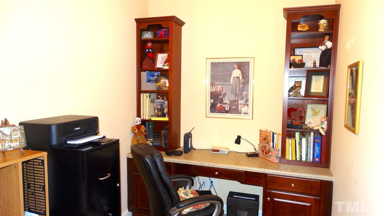 10335 Evergreen Spring Place Raleigh, NC 27614 - Photo 17 of 25 This Office has built in cabinetry and French door for an elegant place to work.