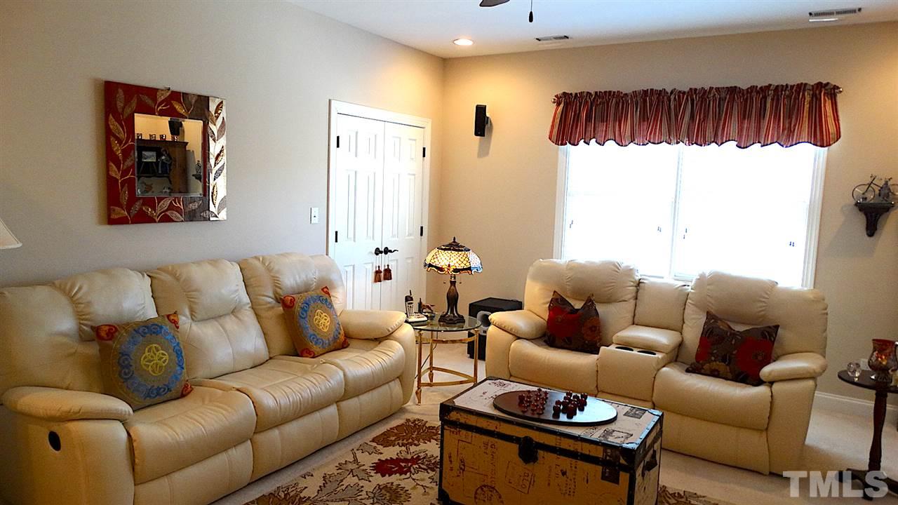10335 Evergreen Spring Place Raleigh, NC 27614 - Photo 18 of 25 Large Bonus Room has room for large furniture, and has an adjoining WALK-IN ATTIC.