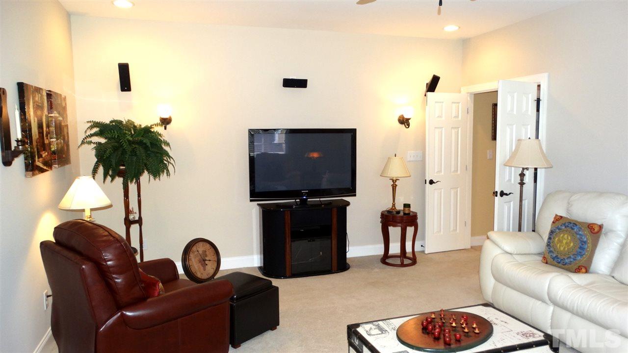 10335 Evergreen Spring Place Raleigh, NC 27614 - Photo 19 of 25 Bonus Room is spacious enough to have a TV/game area as well as large furnishings.