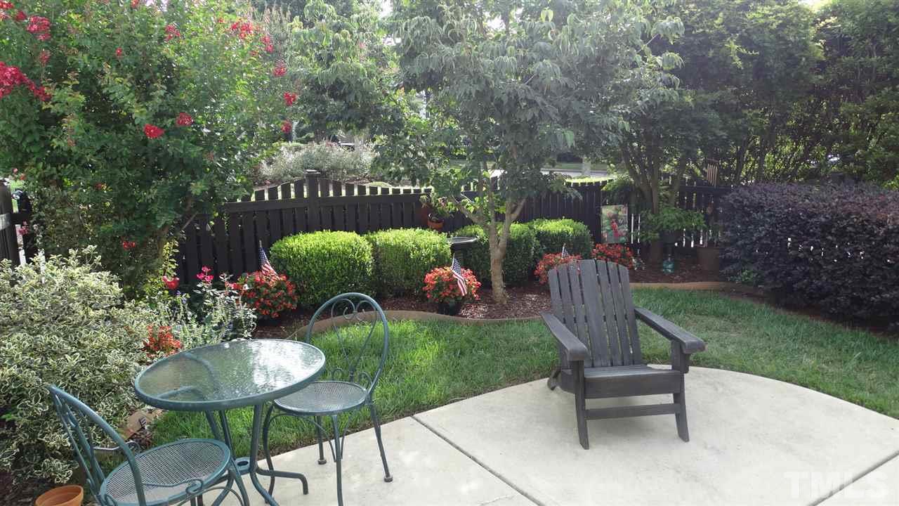 10335 Evergreen Spring Place Raleigh, NC 27614 - Photo 22 of 25 Even the backyard is lovely! Just enough yard to enjoy the landscaping. Low maintenance.