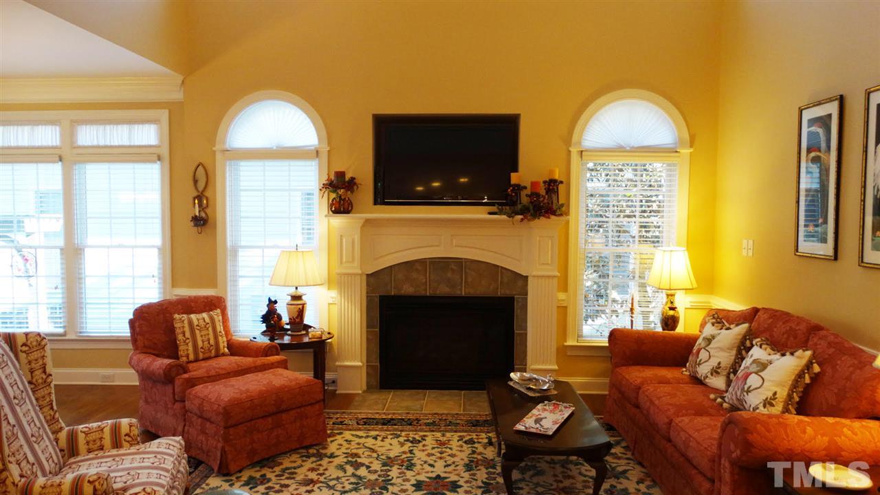 10335 Evergreen Spring Place Raleigh, NC 27614 - Photo 8 of 25 Lovely and elegant 2-STORY Family Room with Gas Fireplace. OPEN to Kitchen & Breakfast Room.