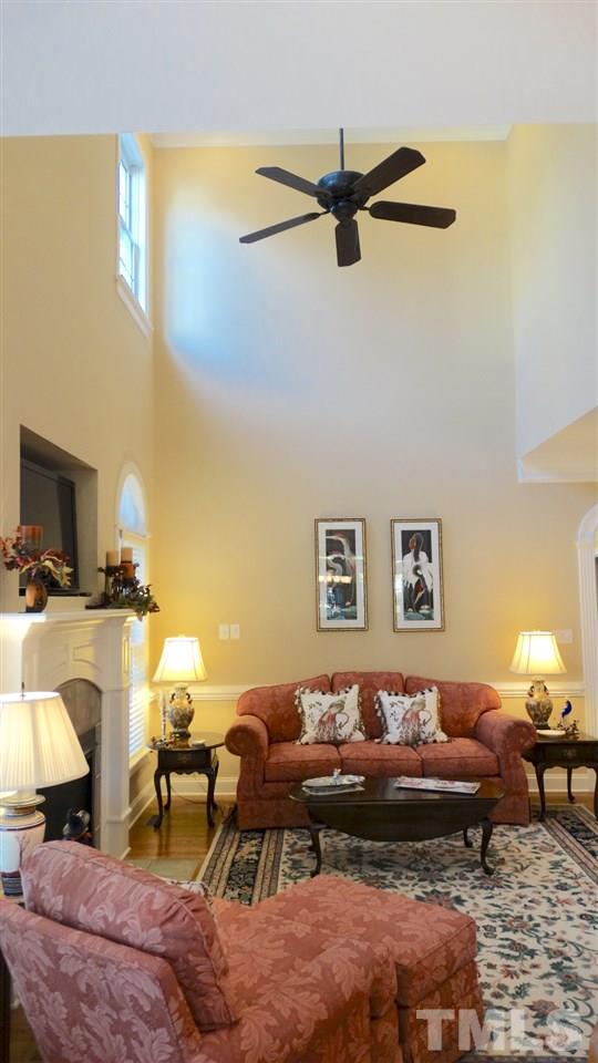10335 Evergreen Spring Place Raleigh, NC 27614 - Photo 9 of 25 Look up, the 2-STORY Family Room also has a ceiling fan to keep you cool and comfortable in our Carolina weather!