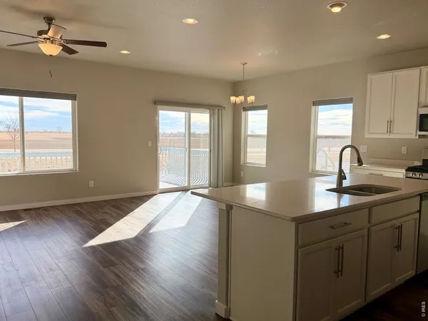 a kitchen with sink and window