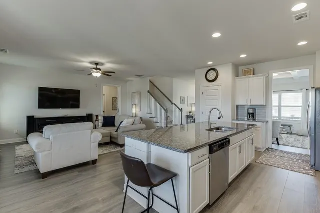 a kitchen with counter top space and a sink