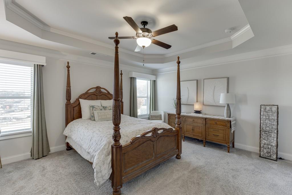 558 Calgary Downs Drive Winder, GA 30680 - Photo 29 of 50 a bedroom with bed and window