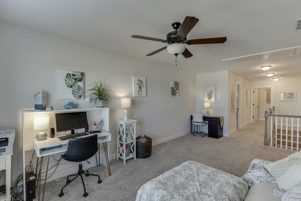 558 Calgary Downs Drive Winder, GA 30680 - Photo 37 of 50 a living room with furniture