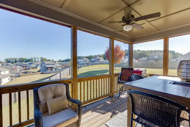 a view of a balcony with furniture