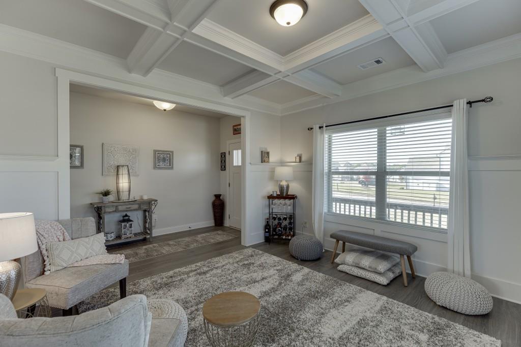 558 Calgary Downs Drive Winder, GA 30680 - Photo 7 of 50 a living room with furniture and a window