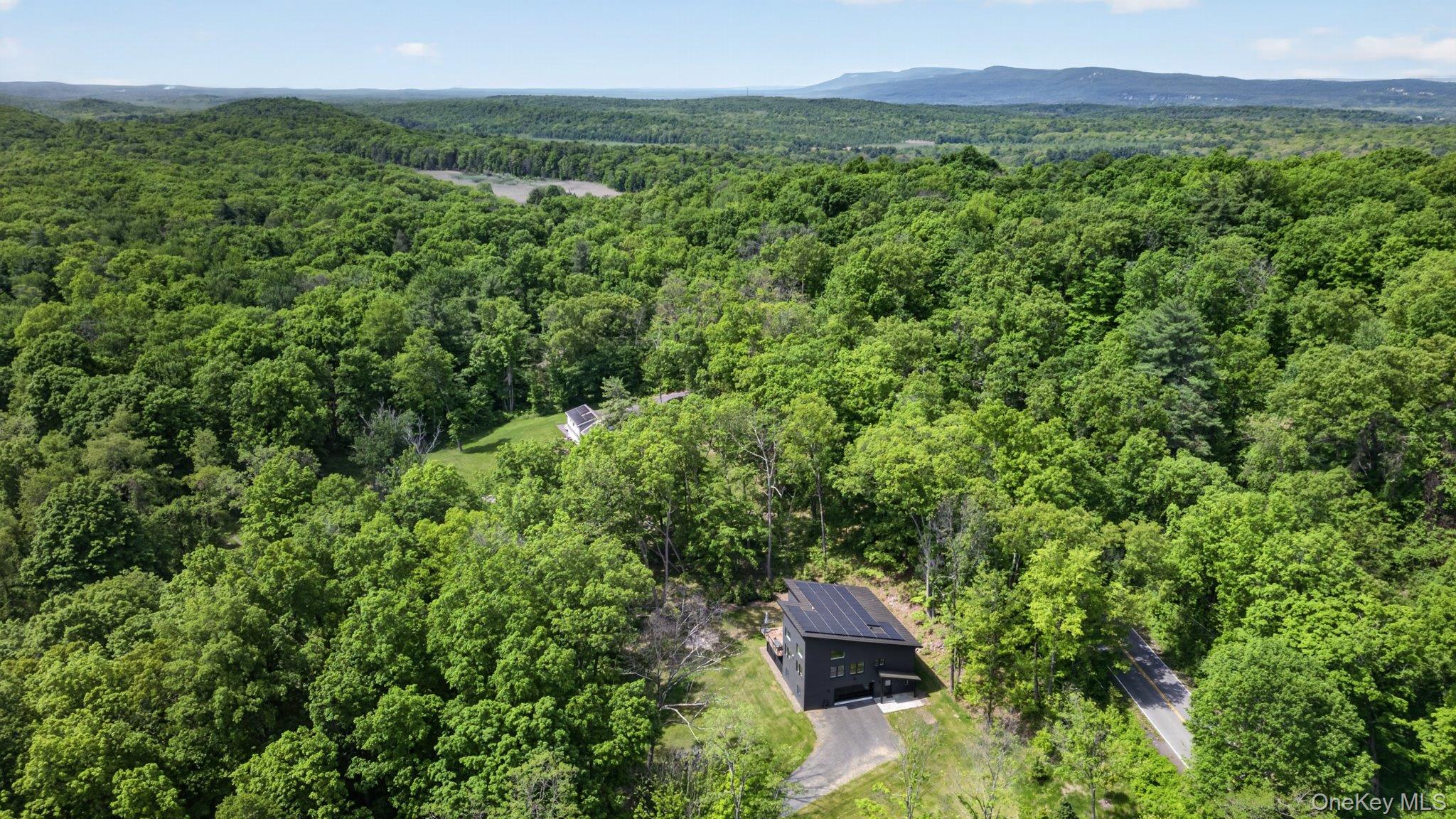 739 Old Post Road New Paltz, NY 12561 - Photo 2 of 47 A modern dwelling situated among extensive mature tree coverage
