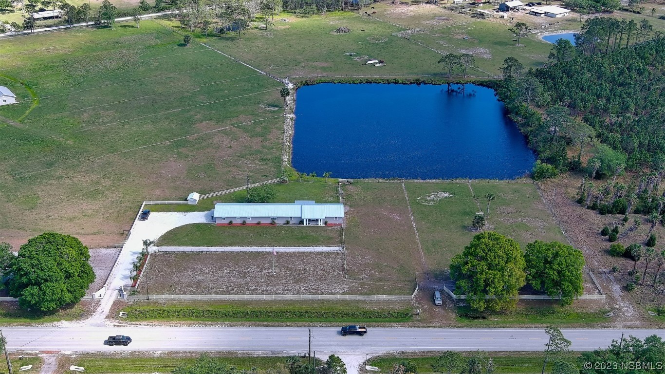 677 State Rte 415 New Smyrna Beach, FL 32168 - Photo 15 of 74 an aerial view of a house