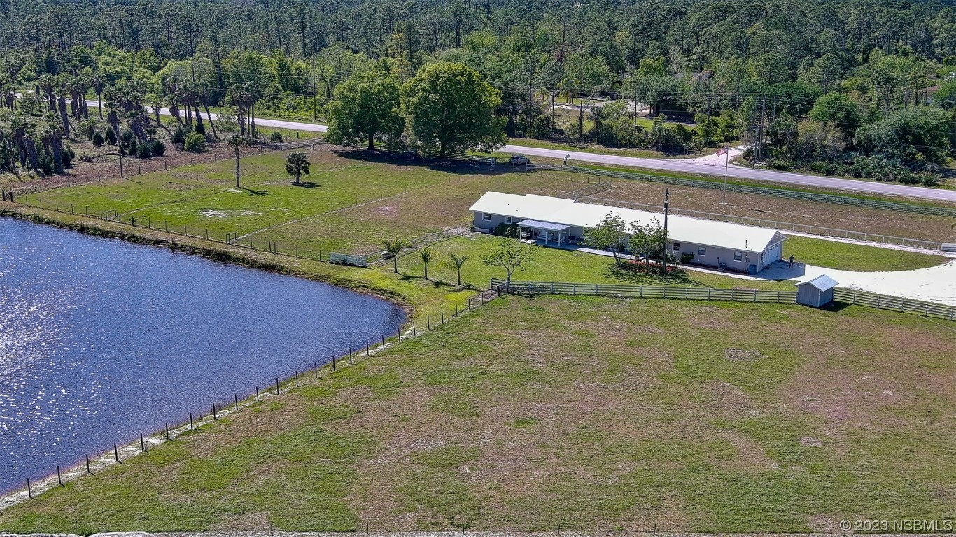 677 State Rte 415 New Smyrna Beach, FL 32168 - Photo 19 of 74 a view of a yard with basketball court