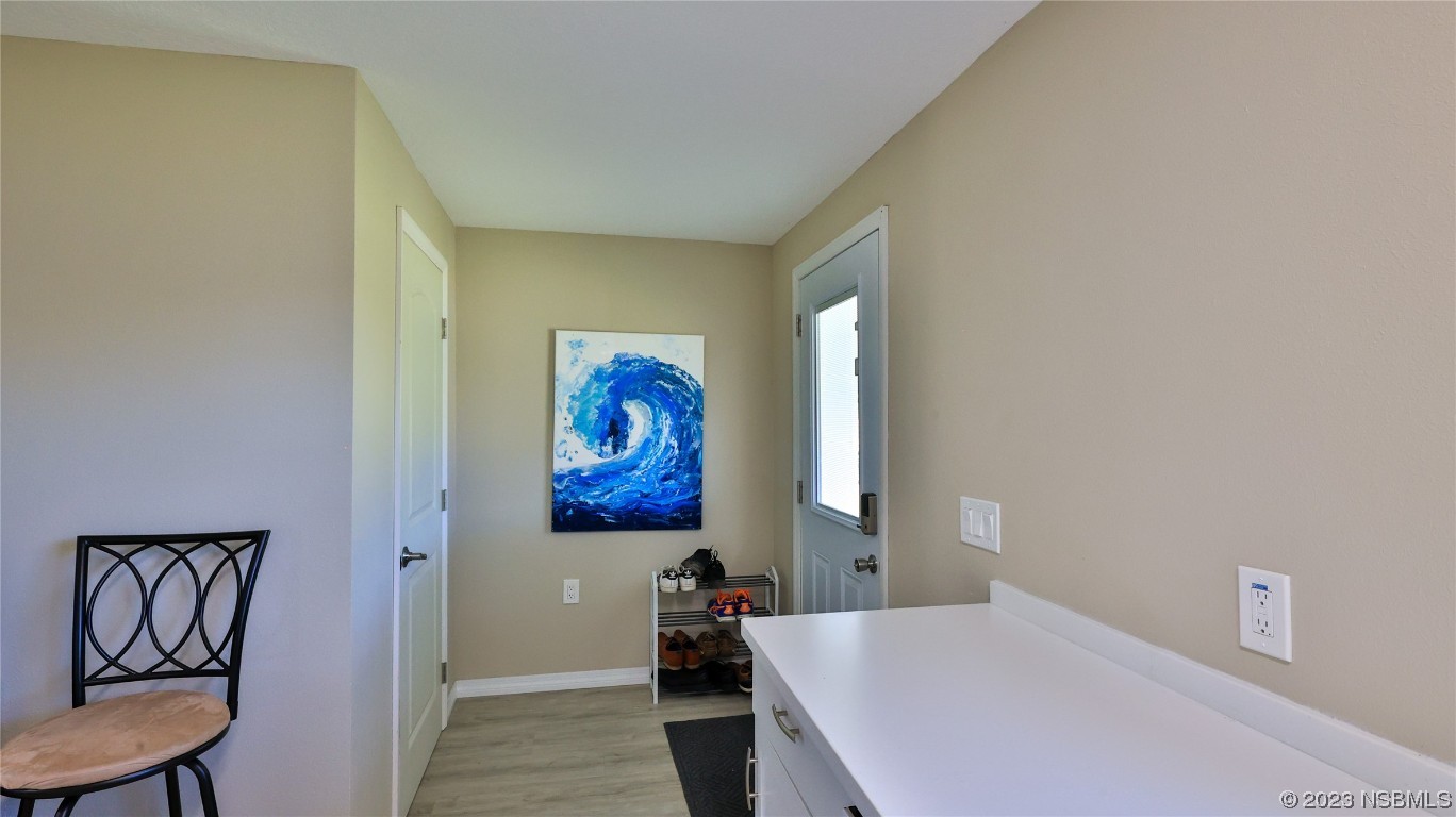 677 State Rte 415 New Smyrna Beach, FL 32168 - Photo 53 of 74 a bedroom with a bed and furniture