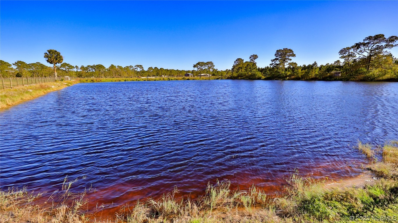 677 State Rte 415 New Smyrna Beach, FL 32168 - Photo 65 of 74 a view of ocean with sky view
