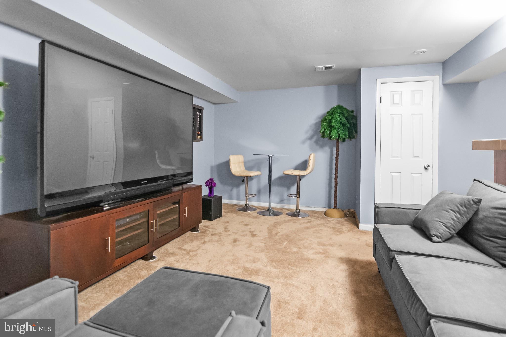 11 Strabane Court Baltimore, MD 21234 - Photo 35 of 45 Cozy basement retreat with modern flair.