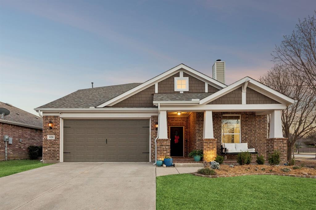 624 Allbright Road Celina, TX 75009 - Photo 2 of 35 a front view of a house with a yard and garage