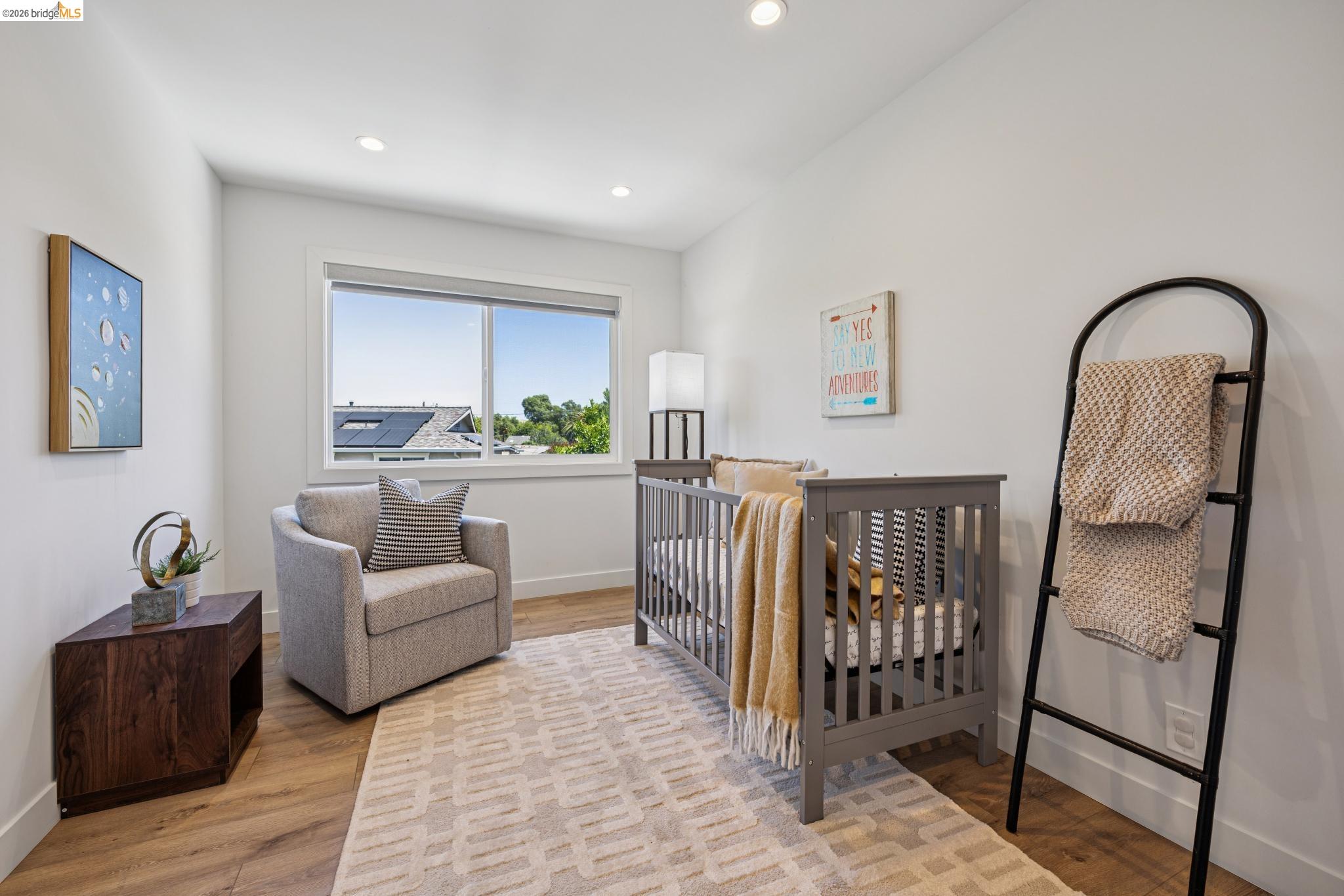 11 Belinda Court San Ramon, CA 94583 - Photo 27 of 33 Bright room featuring a large window, recessed lighting, and wood-finish flooring