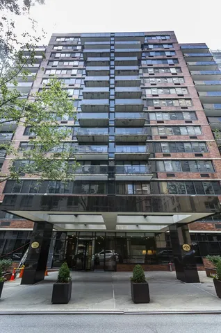 a view of a building with a garden