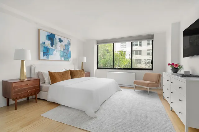 a view of a balcony with wooden floor