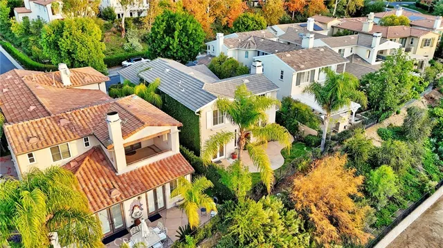 a kitchen with stainless steel appliances kitchen island granite countertop a sink and cabinets
