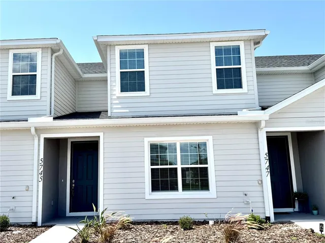 a building with garden in front of it