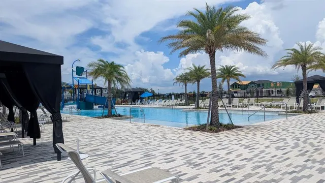 a view of front door with a table and chairs