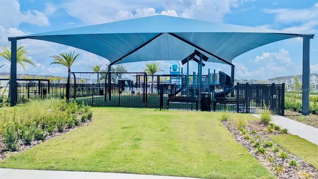 a view of swimming pool with a yard