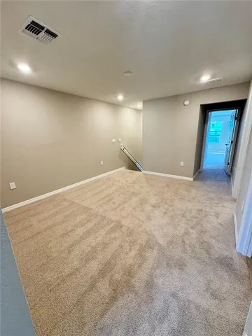 a view of a room with an empty space