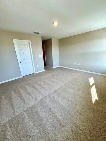 a bathroom with a double vanity sink and mirror