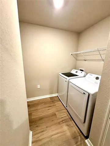 a bathroom with a sink a toilet and bathtub