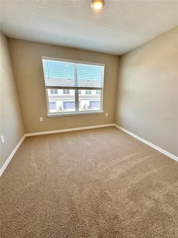 a view of a room with an empty space