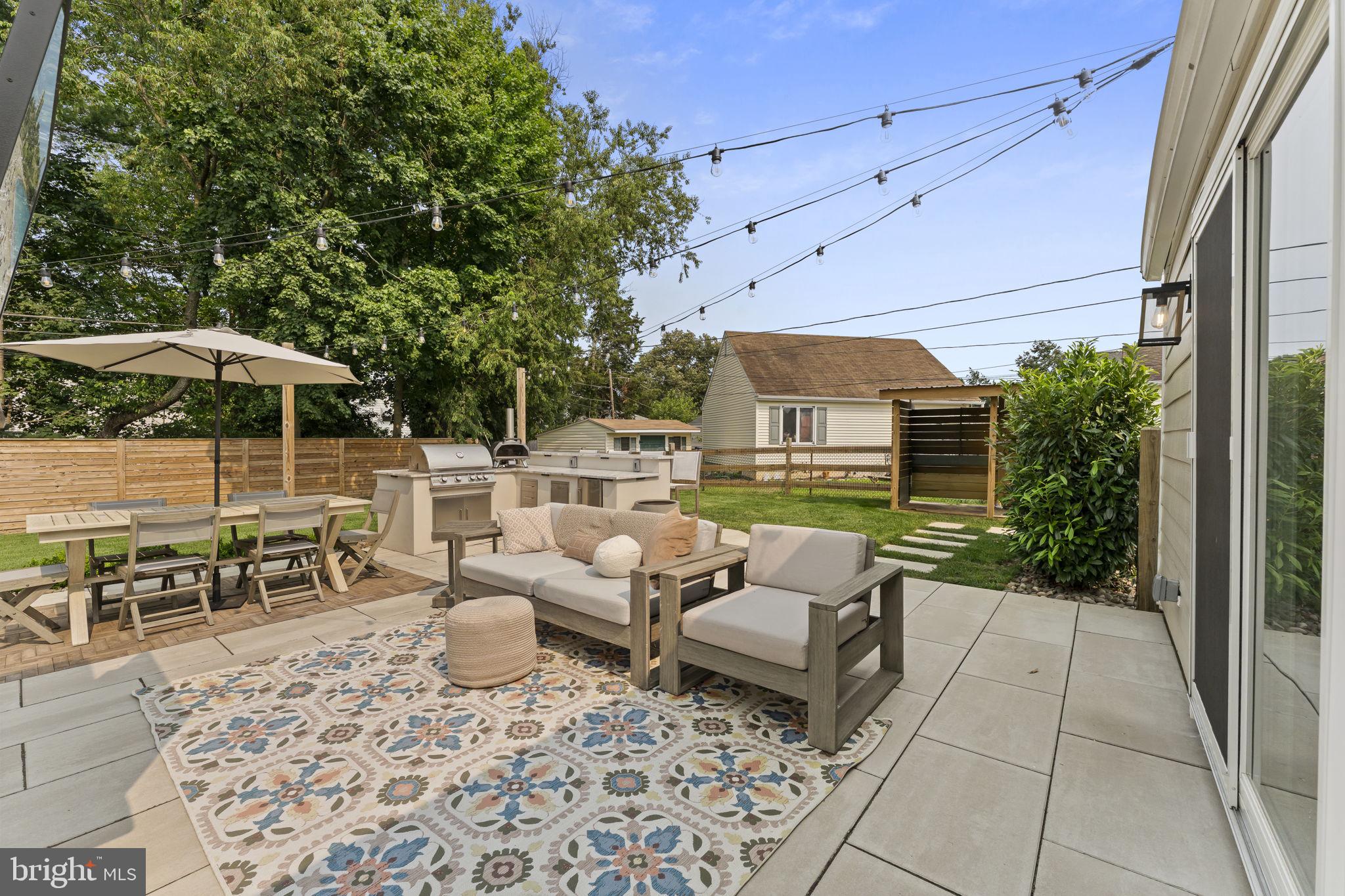 113 Manor Road Paoli, PA 19301 - Photo 34 of 44 a view of a patio with chairs and tables