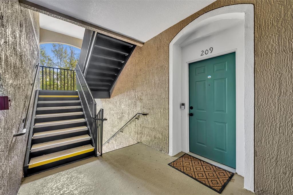 581 Brantley Terrace Way, Unit 209 Altamonte Springs, FL 32714 - Photo 1 of 1 a view of entryway with a front door
