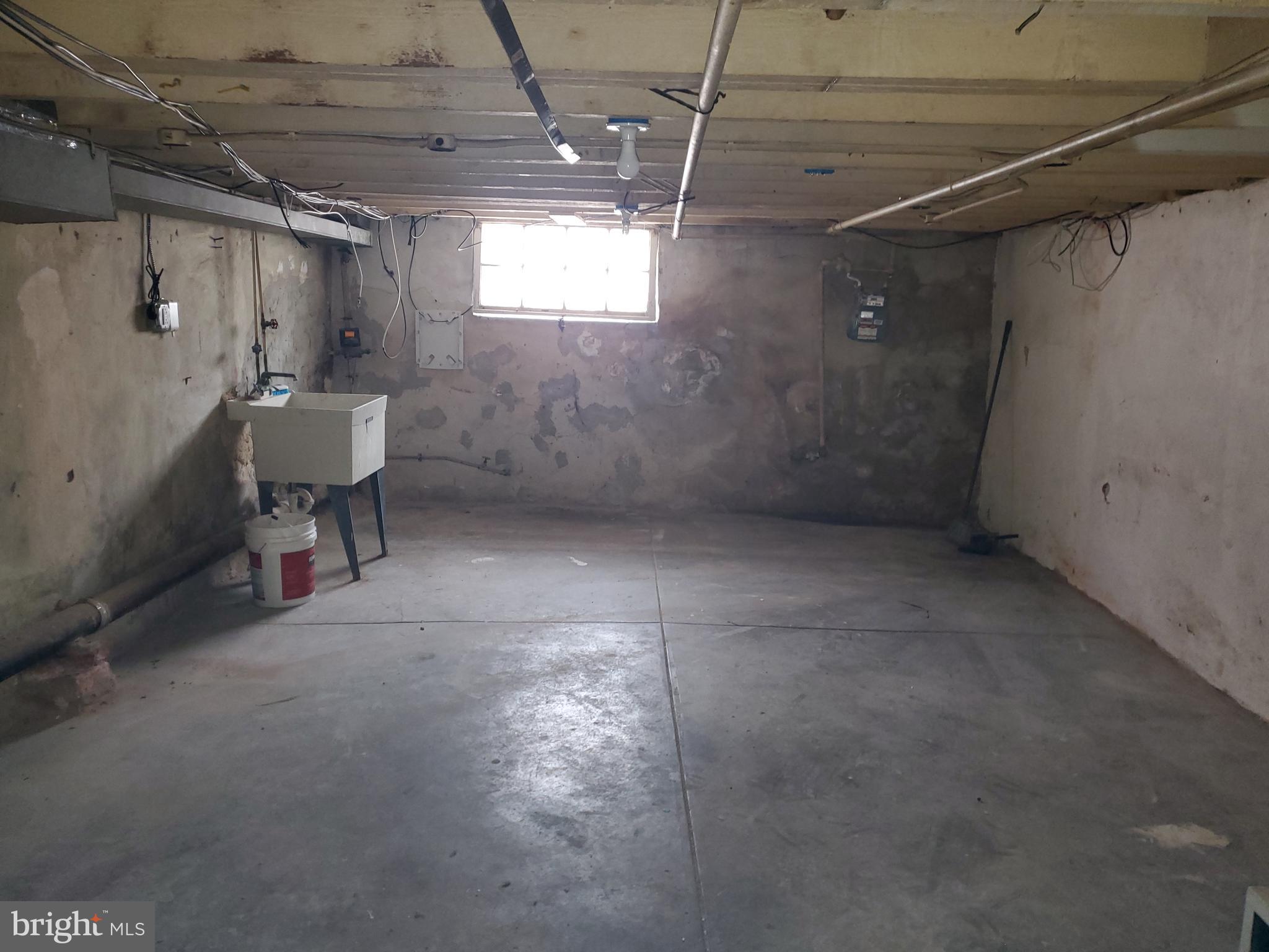 3050 Memphis Street Philadelphia, PA 19134 - Photo 20 of 20 a view of a room with a chair and a ceiling fan