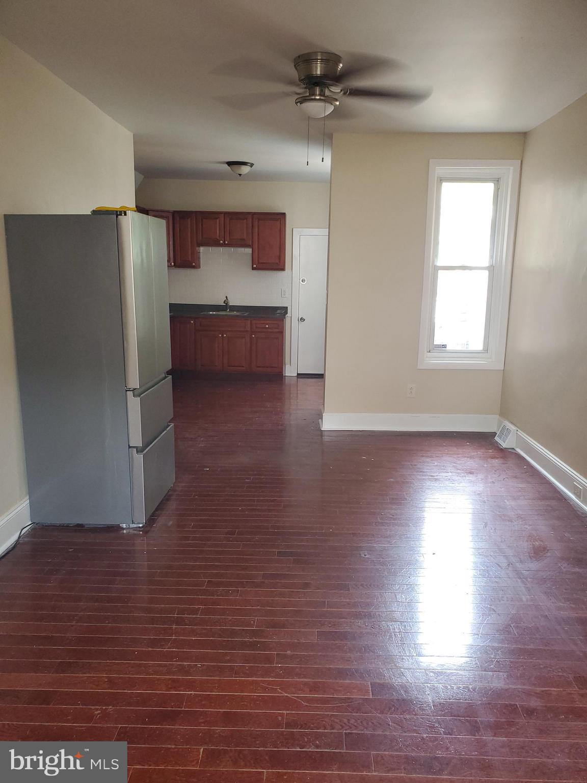 3050 Memphis Street Philadelphia, PA 19134 - Photo 2 of 20 a view of kitchen and hall with wooden floor