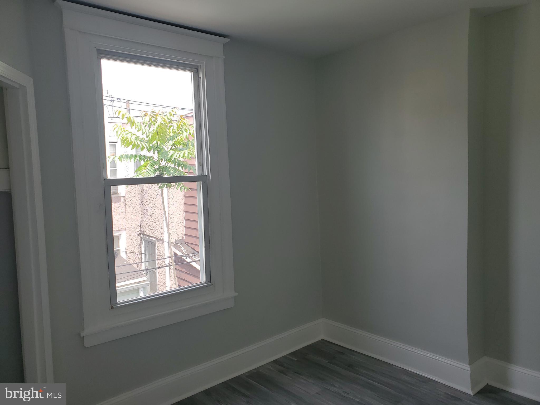 3050 Memphis Street Philadelphia, PA 19134 - Photo 7 of 20 a small space with wooden floor and a window