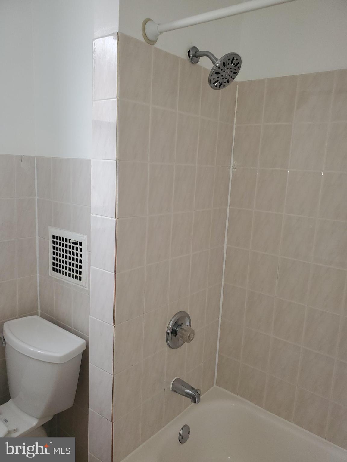 3050 Memphis Street Philadelphia, PA 19134 - Photo 10 of 20 a bathroom with a toilet and a shower