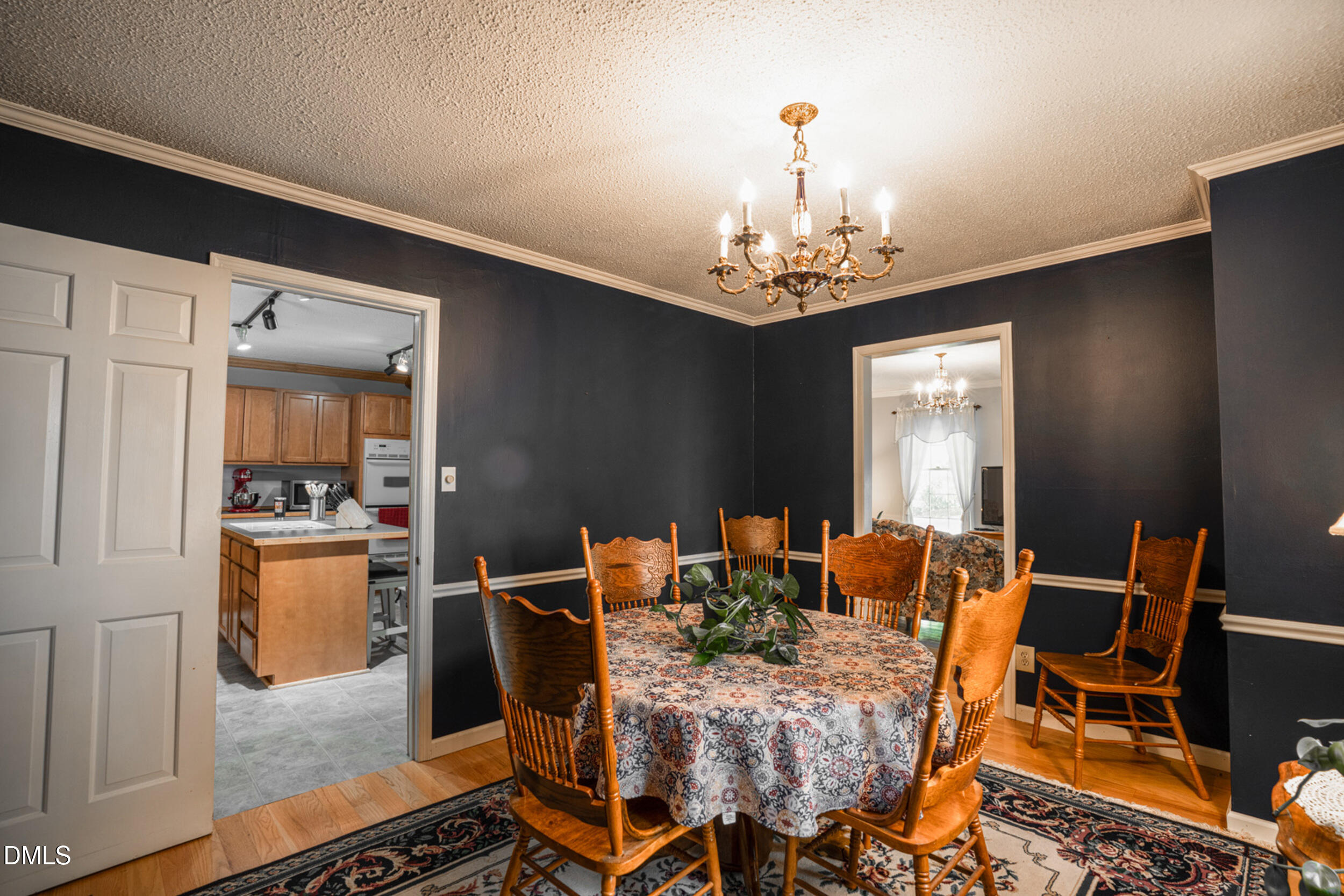 1008 East Millbrook Road Raleigh, NC 27609 - Photo 6 of 28 06_Dining_Room_To_Kitchen