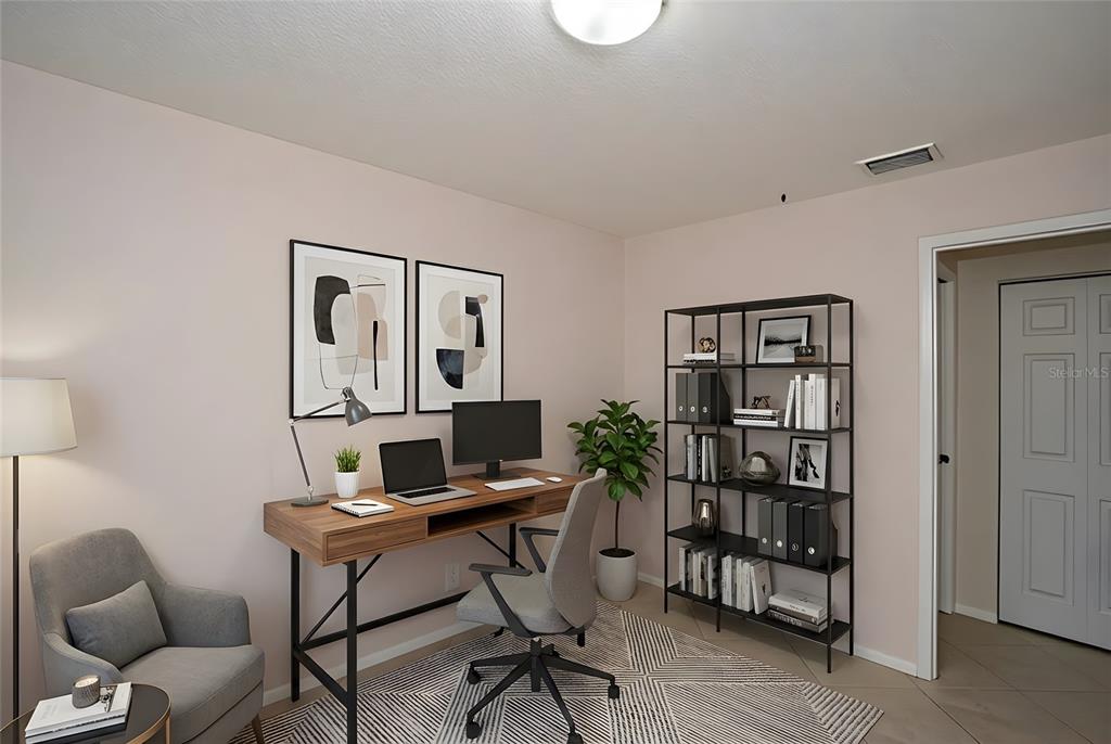 11511 113th Street, Unit 13H Largo, FL 33778 - Photo 20 of 28 a view of a workspace with furniture