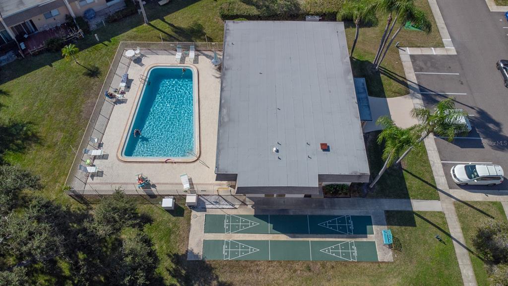 11511 113th Street, Unit 13H Largo, FL 33778 - Photo 26 of 28 a view of house with a yard