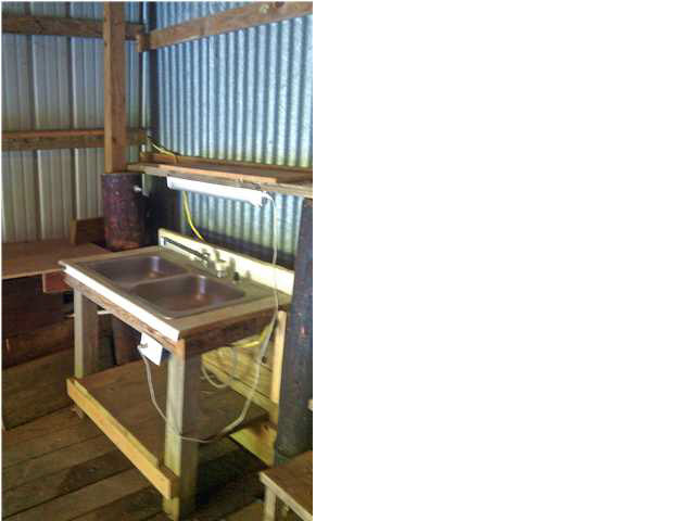 Fish cleaning area inside boathouse
