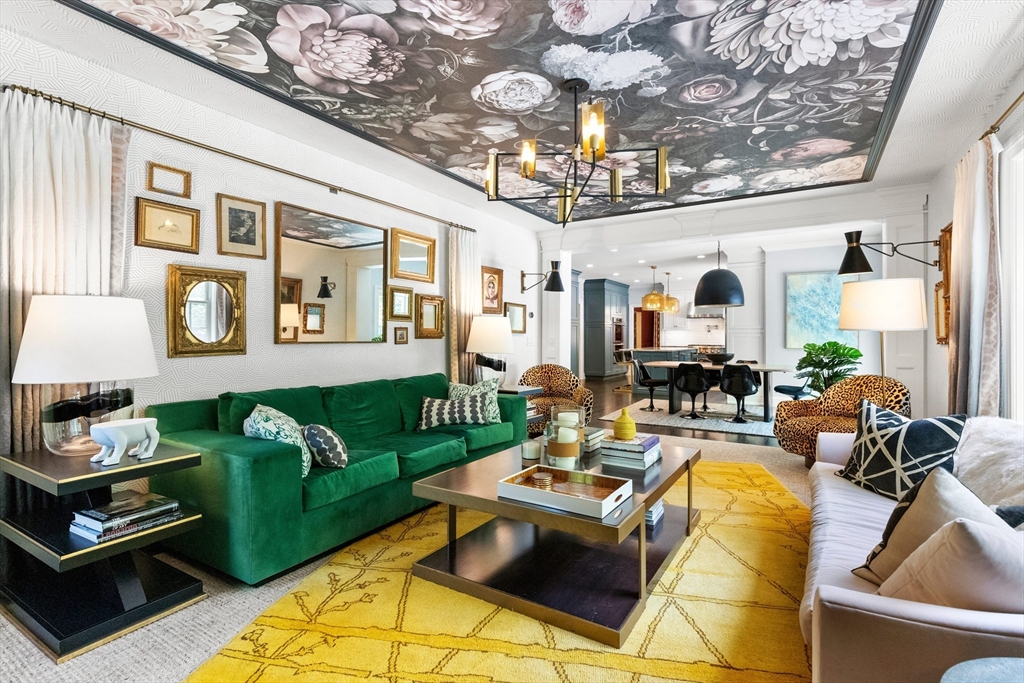 12 Cooke Road Lexington, MA 02420 - Photo 17 of 42 a living room with fireplace furniture and a chandelier