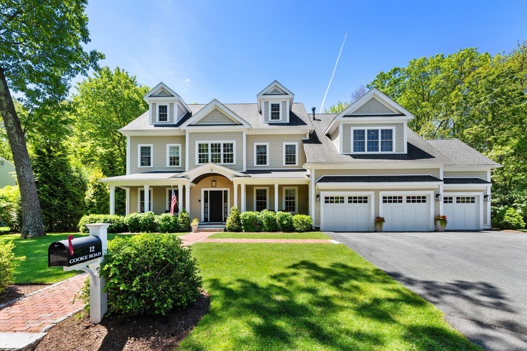 12 Cooke Road Lexington, MA 02420 - Photo 2 of 42 a front view of a house with a yard