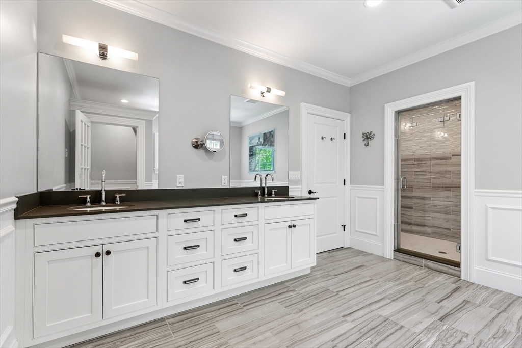 12 Cooke Road Lexington, MA 02420 - Photo 25 of 42 a spacious bathroom with double sink and a large mirror